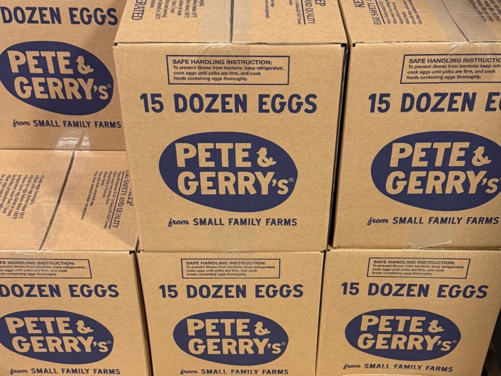 Stacked boxes that say 15 dozen eggs on the side with the Pete & Gerry's logo.